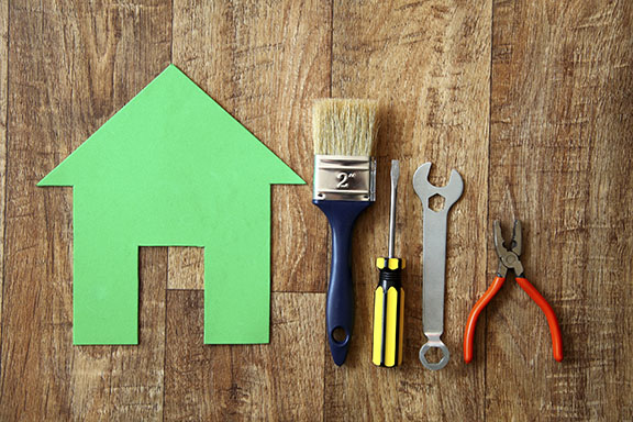 house icon with tools next to it