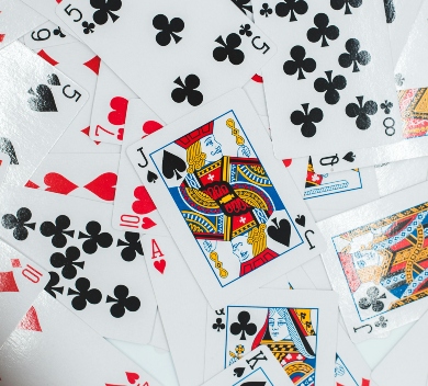 playing cards scattered and overlapping one another